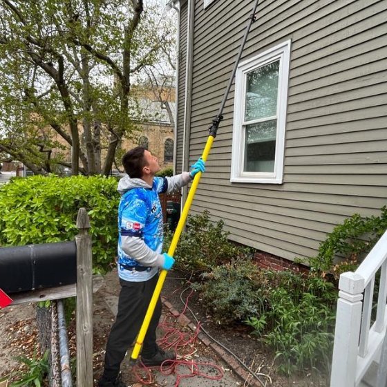 Window cleaning with an extension pole in Cambridge, MA